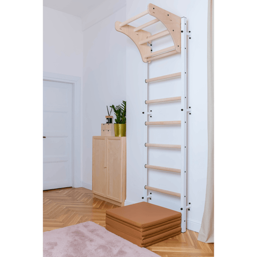 A white BenchK wall bar with a solid wood pull-up bar situated in a living space, exemplifying its dual function as decor and fitness equipment.