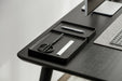 Black Catch-All Tray with Scissors and Ruler on Home Office Desk