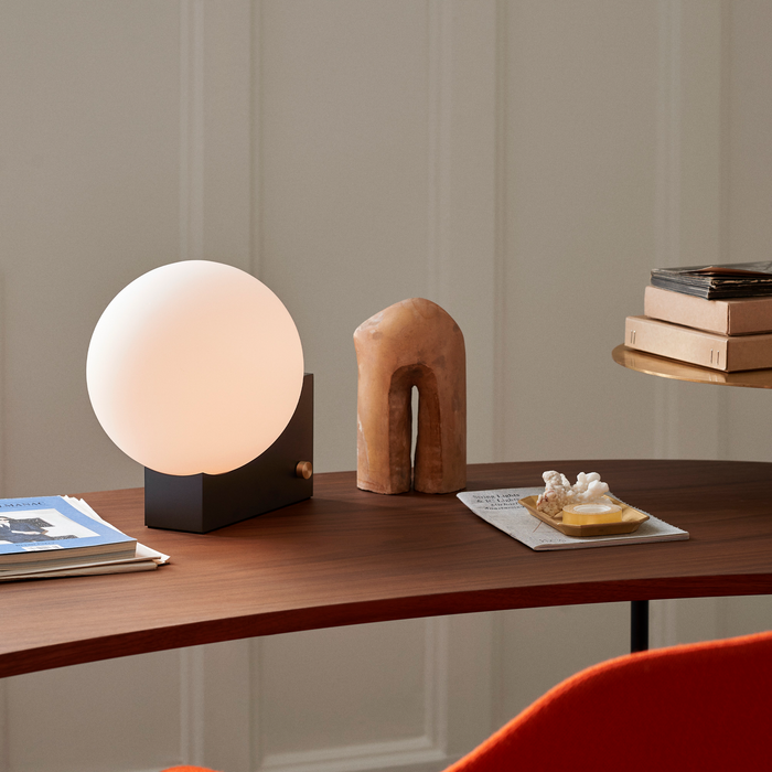 Black &Tradition SHY1 Journey Table Lamp on a minimalist workspace setup. 