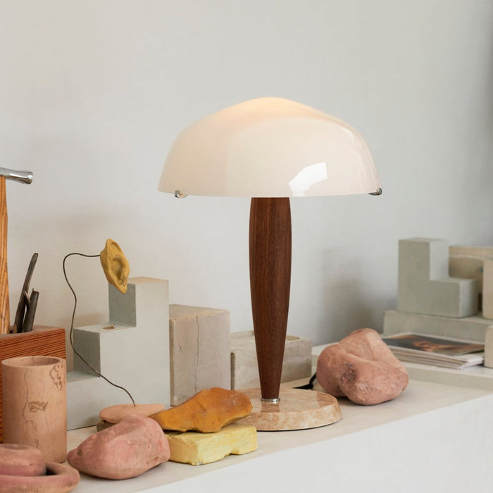 &Tradition SHY3 Herman Table Lamp near natural elements like rocks