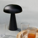 Black &Tradition SC53 Como Portable Lamp on dining table. 
