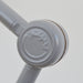 "Close-up view of the elbow of the Midgard Modular Clamp Lamp 552, featuring the Midgard logo.